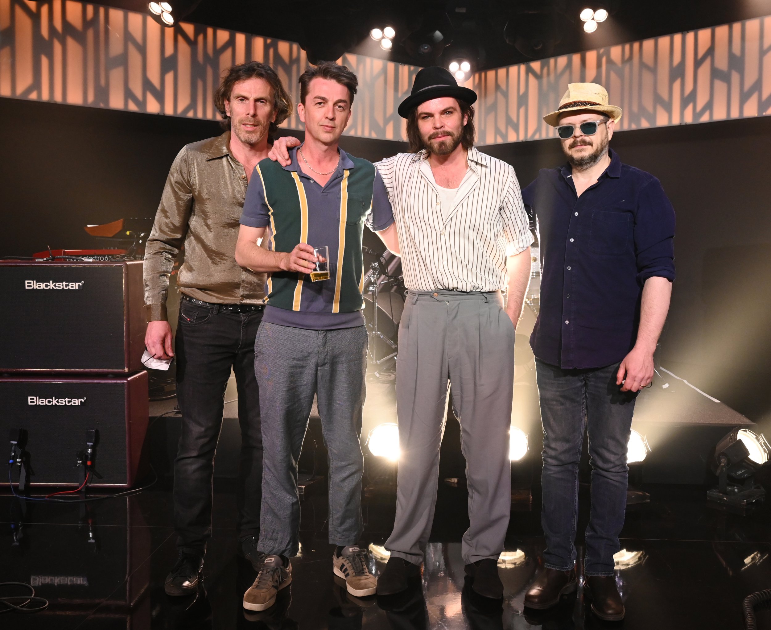 Supergrass pose on stage during filming for Jimmy Kimmel Live!