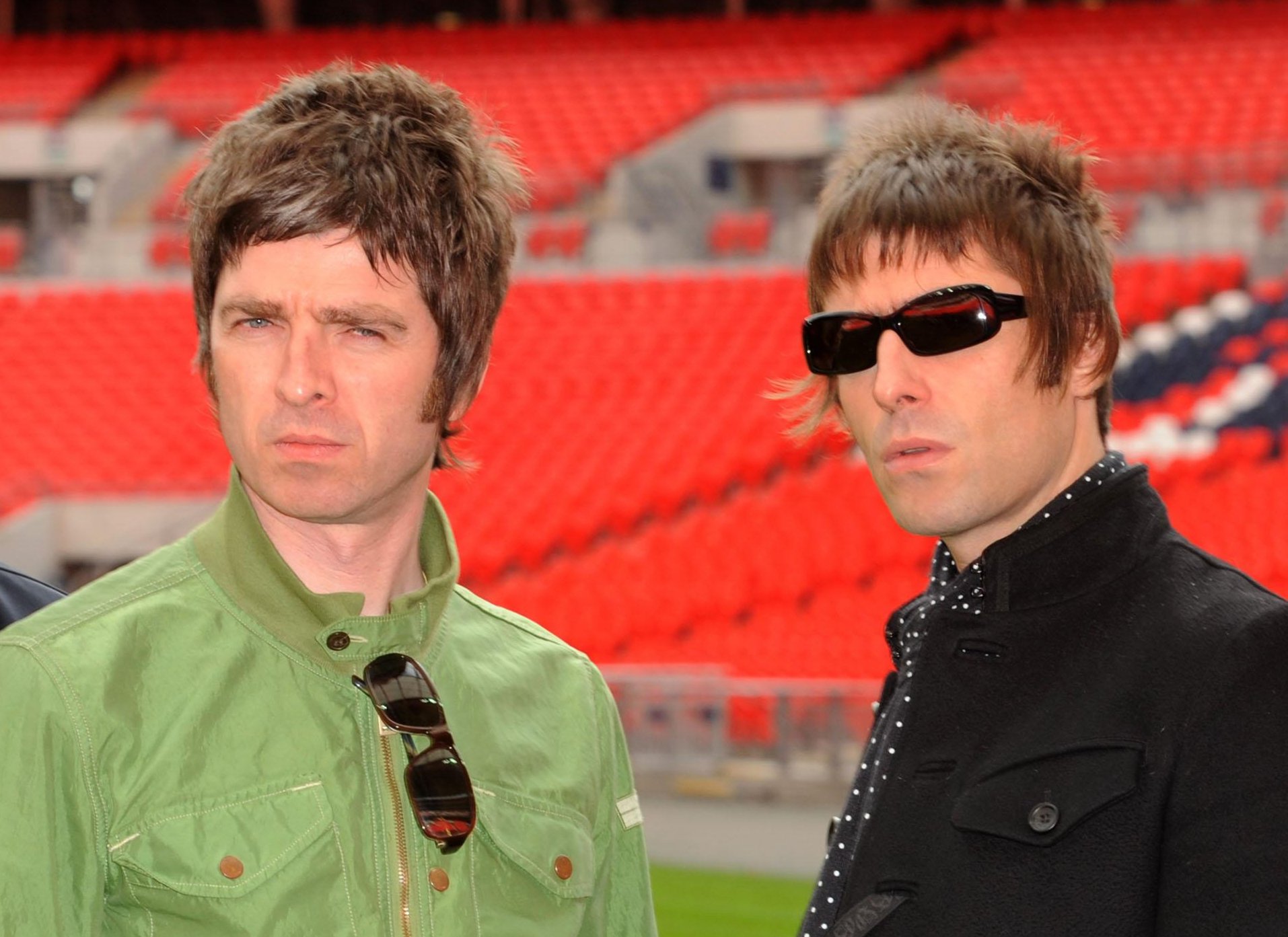 Oasis band members Noel Gallagher and Liam Gallagher during a photocall at Wembley Stadium